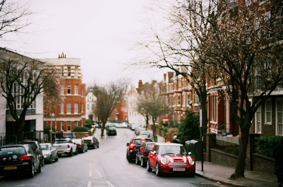 Red Mini Cooper Parked Near Brown Tree